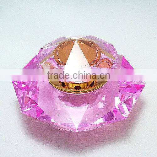 green color crystal decorative perfume bottle with golden flower