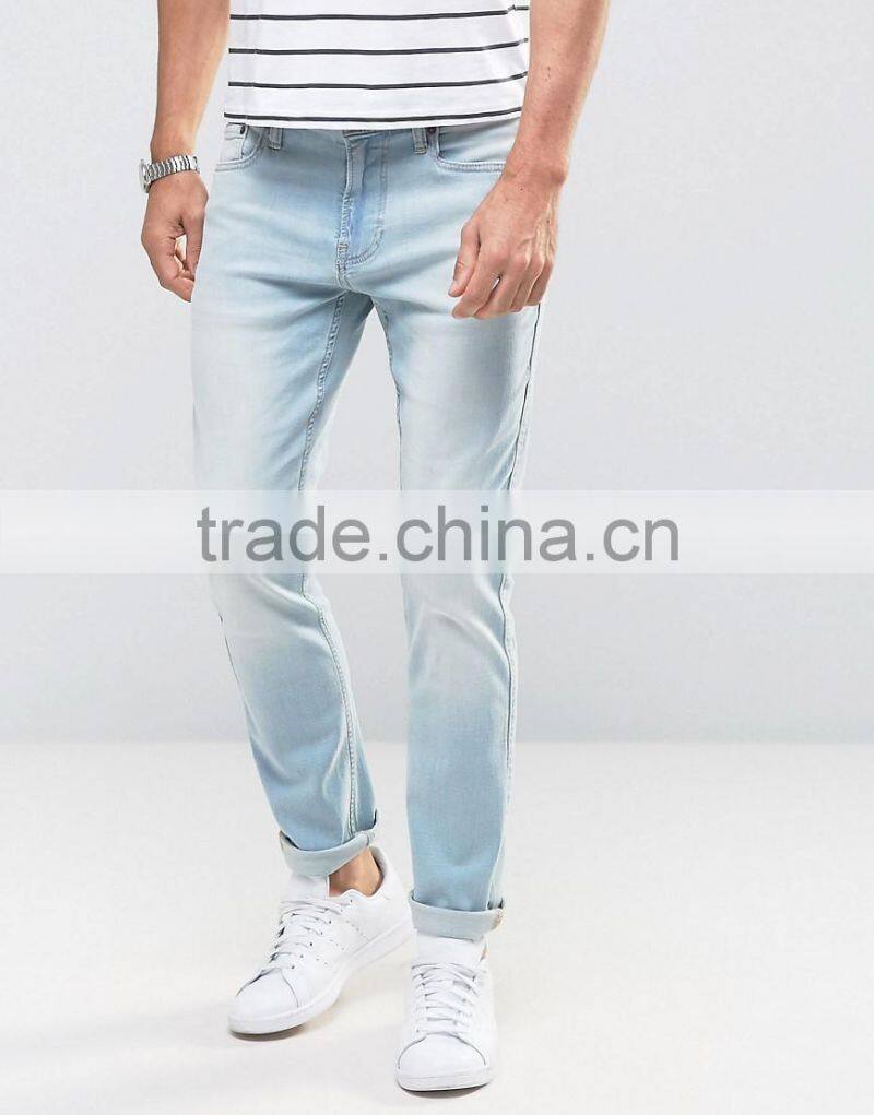 New Fashion Stretch Slim Jeans With Rips In Mid Wash for man