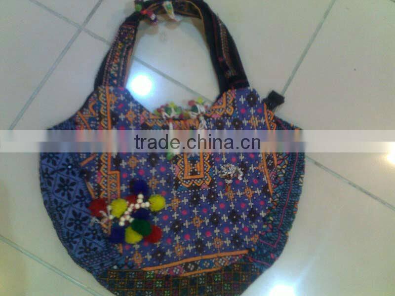 tribal ethnic bags with embroidery, tassels, pom-pom and coin