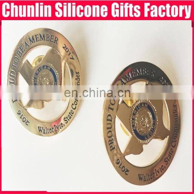 carved lapel pin with resin