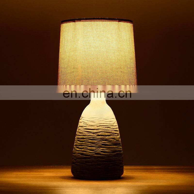 antique ceramic meterial beside table lamp