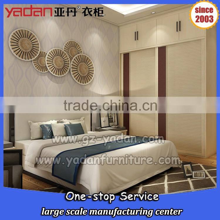 Light color bedroom closet design sliding door wardrobe and bed