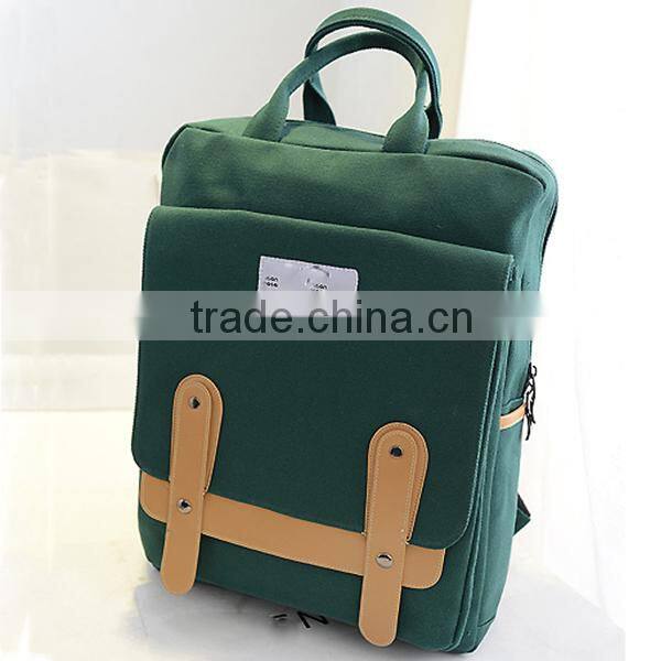 blue canvas travel backpack with laptop compartment