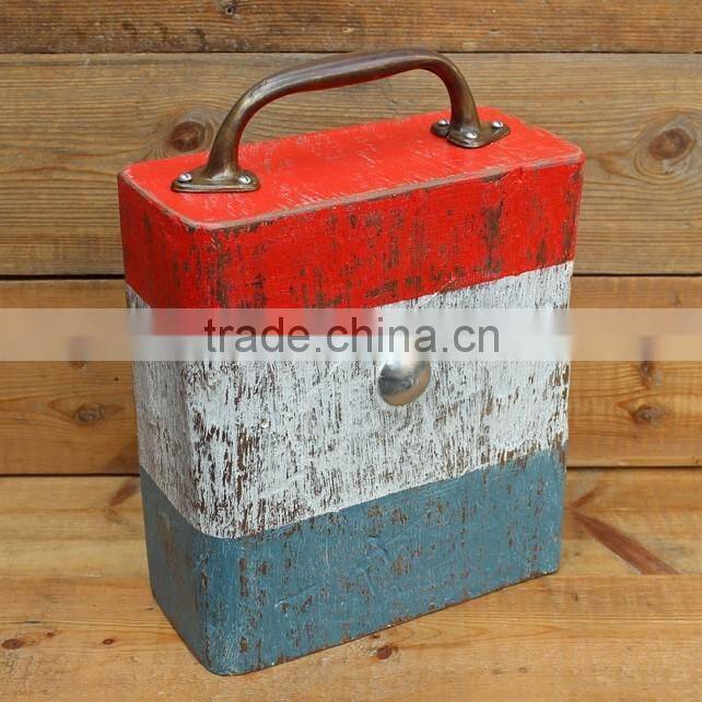 older aged wooden door stop