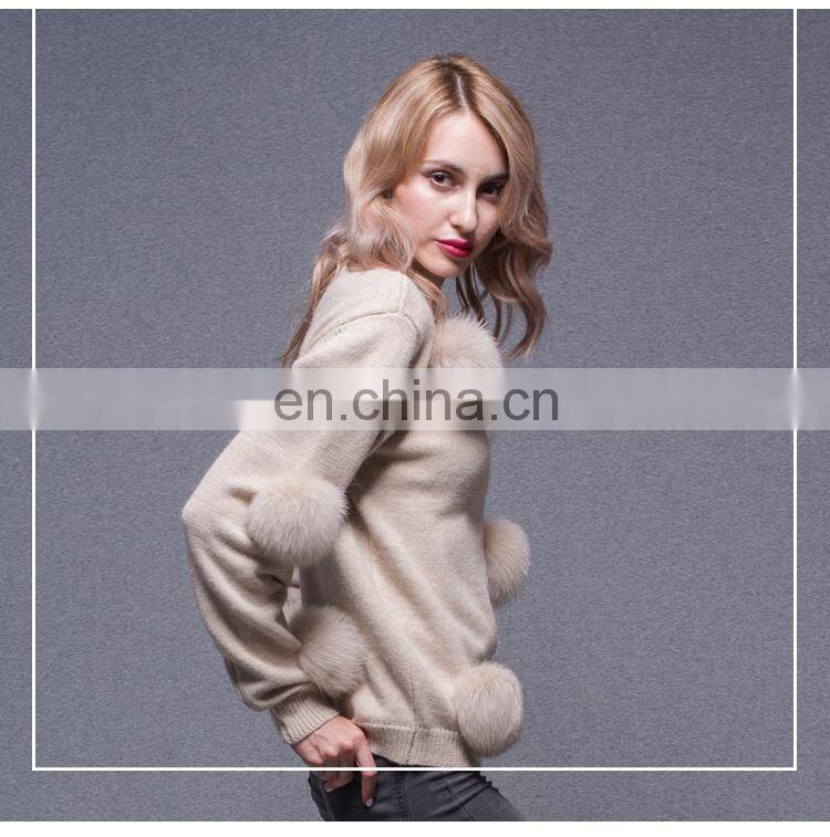 Woman black custom pullover sweater with a lot fox fur ball