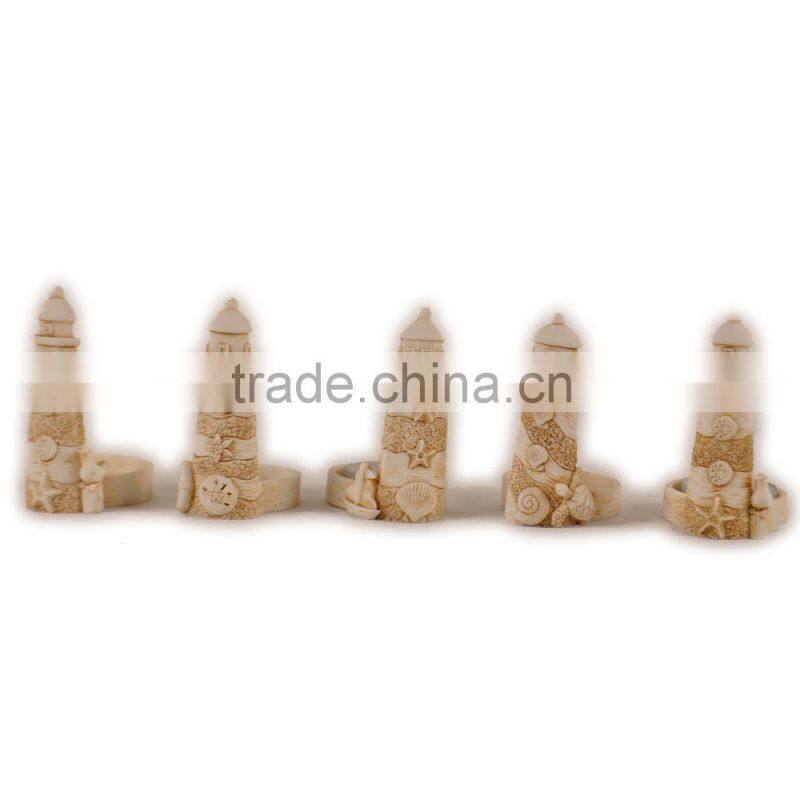 Candlestick with coconut tree and shell on lighthouse statue