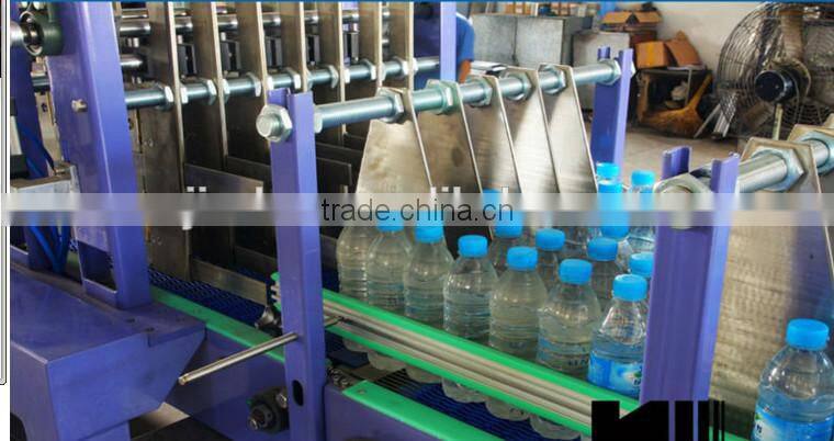 Automatic hot shrink film wrapping packing machine