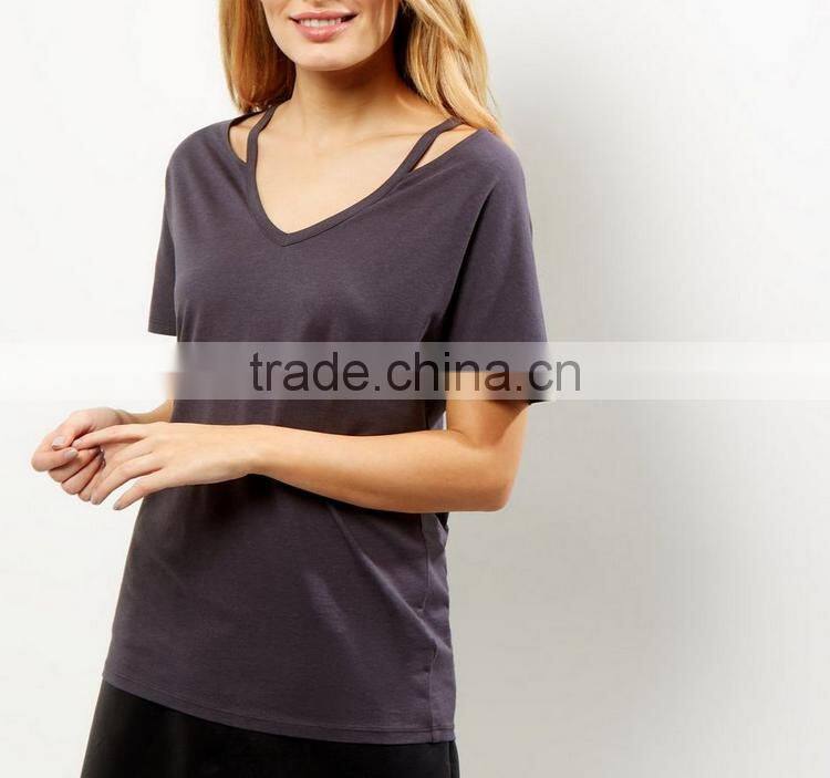 Black women ripped cut out elongated t shirt of coton material