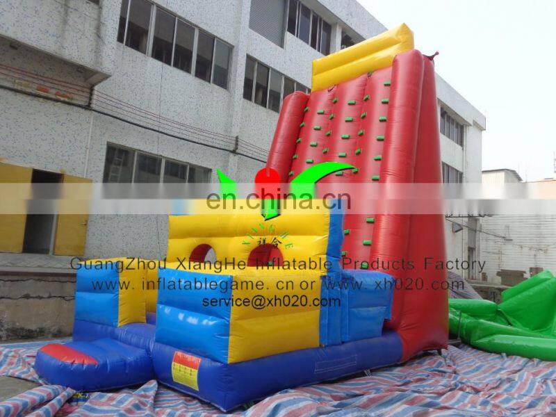Inflatable climbing wall with obstacle course