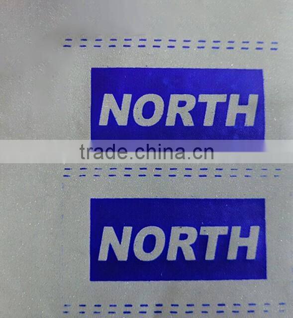 Reflective logo with brand be sewn on bags or garments