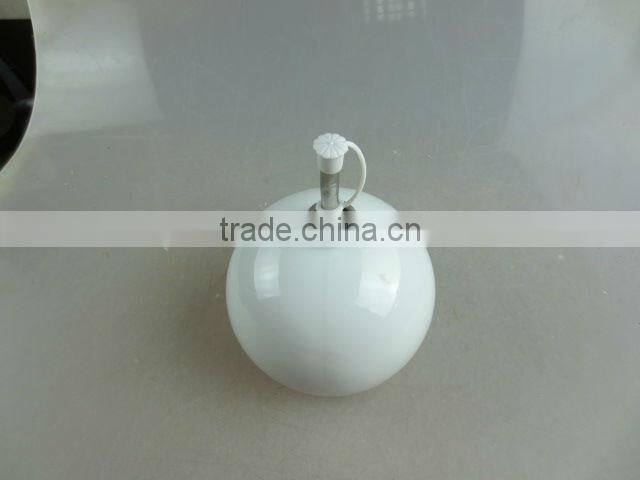 round porcelain sauce bottle
