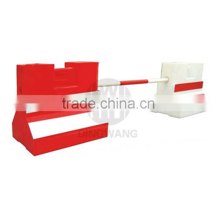 plastic jersey barriers on road