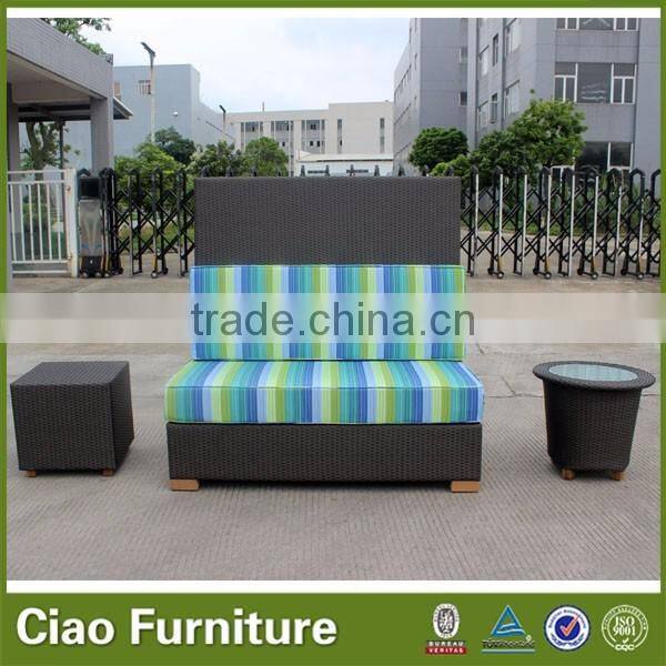 Outdoor Rattan Bench With Colorful Cushion Sitting