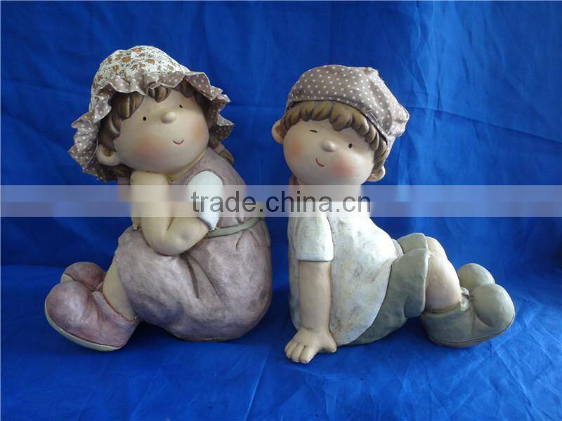 resin garden boy and girl statue