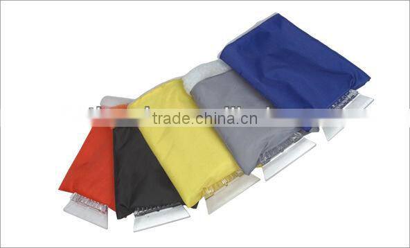 red ice scraper with glove