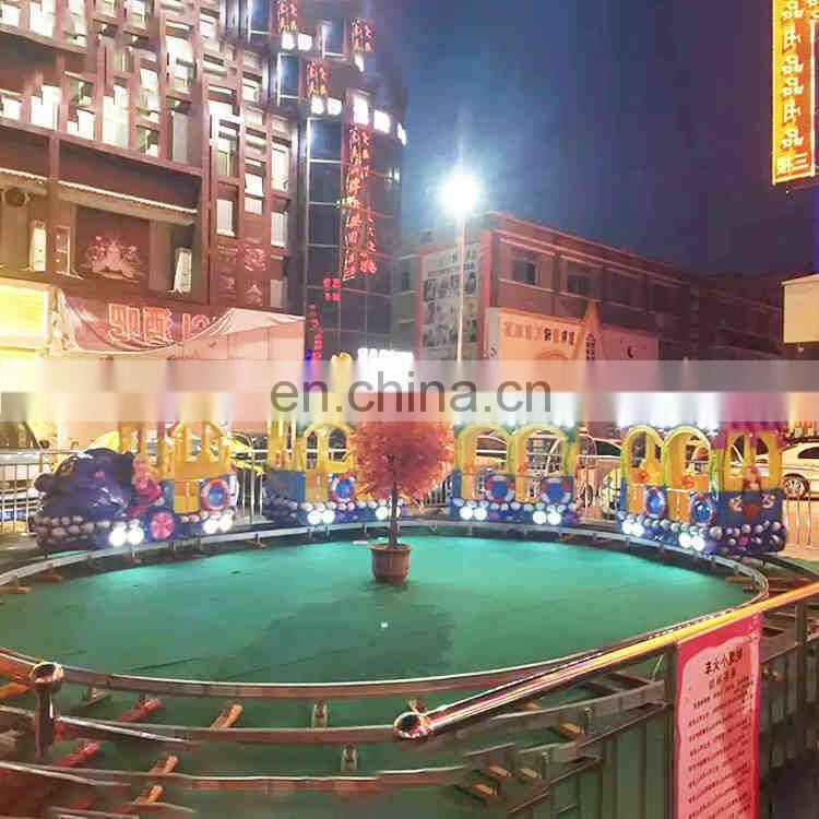 Amusement park rides kids electric train ocean track train