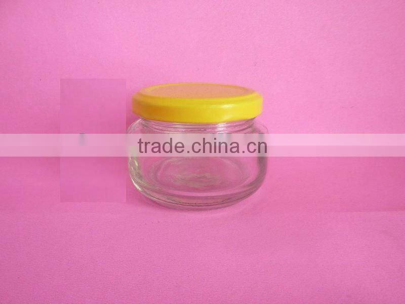 small glass container, glass pickle bottle