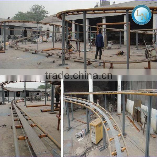 Amusement park children electric train toy ride slide dragon train/roller coaster for sale