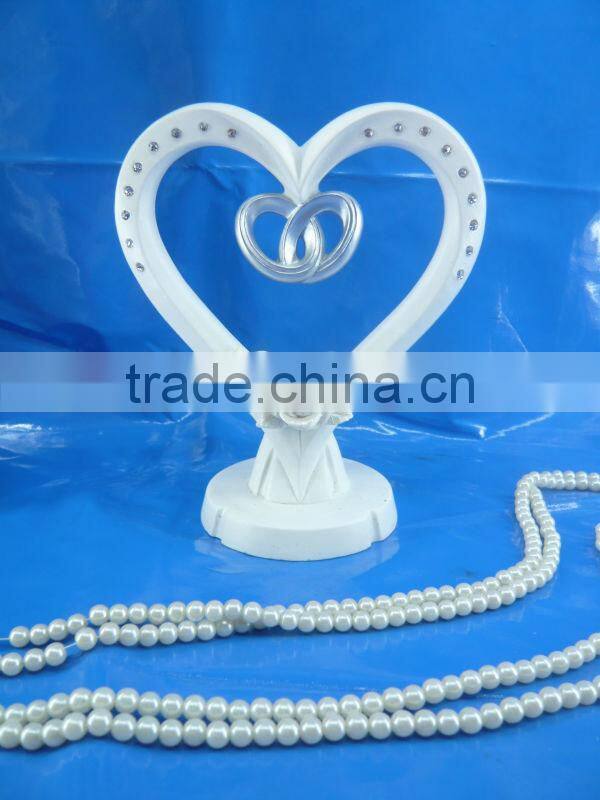 2014 hot selling resin heart wedding cake topprs