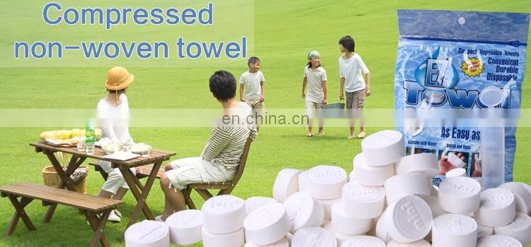 Eco friendly100% rayon material OEM compressed tissue/magic coin hotel napkins/paper roll compressed tablet wipe