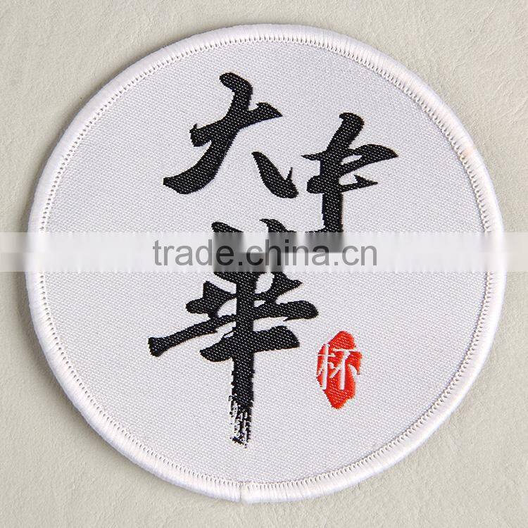 Hangzhou label company manufacture white woven badge label for cluture clothing