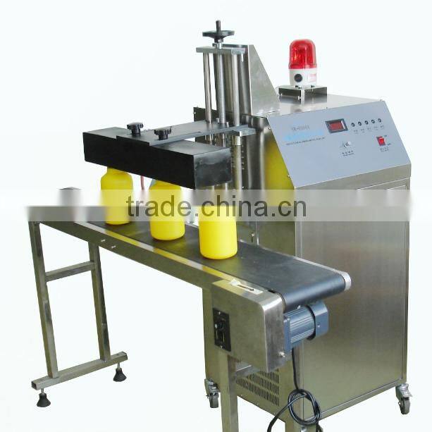 Automatic continuous electromagnetic induction aluminum foil jar heat sealing machine