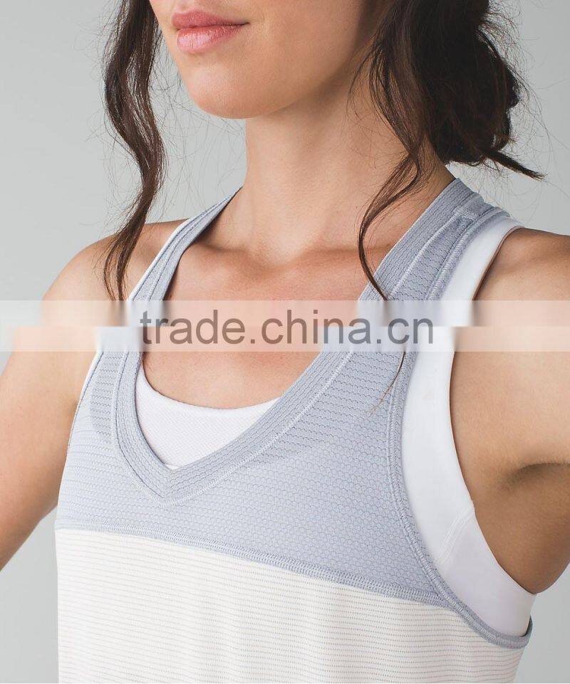 Contrast color sleeveless made in china elegant women top