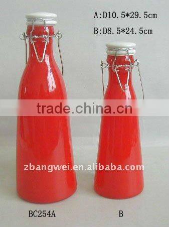 2 sizes glass bottle with sprayed red color