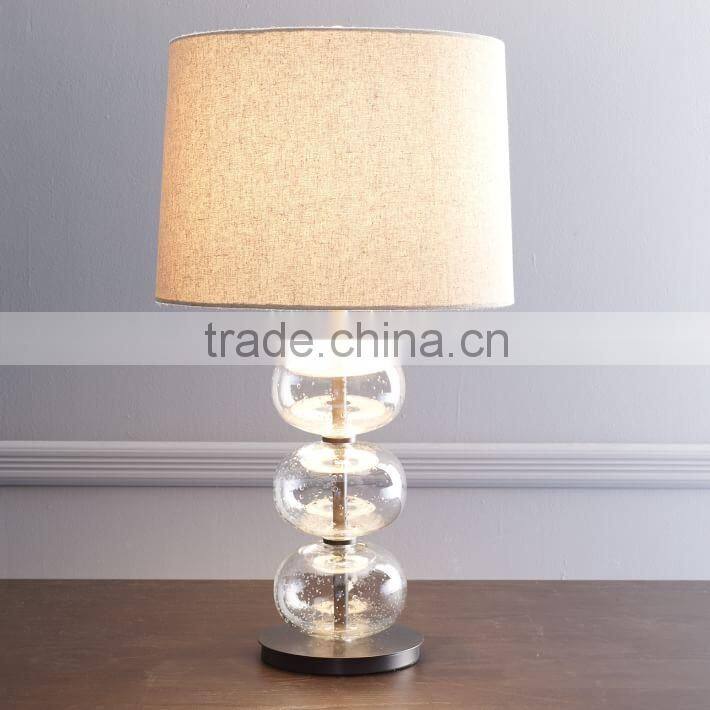 0627-11 Strung together like beads on a necklace, the Abacus Glass act Clear Table Lamp