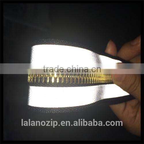 TPU wholesale clothing with brass reflective zipper