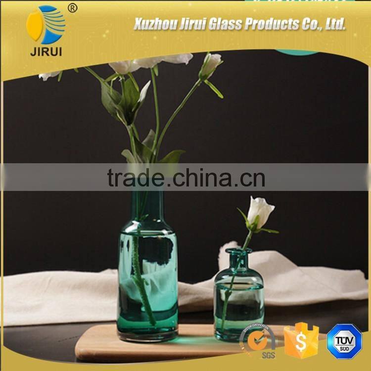 Wide mouth blue glass vase for home decoration with flower