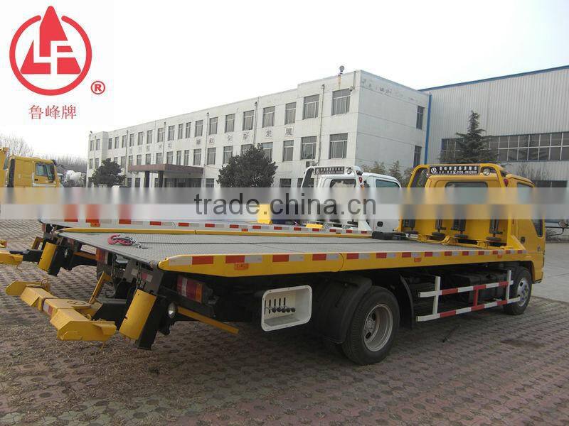 Light Duty ISUZU 5 Ton slide flatbed road wrecker tow truck for sale which could transport 20ft container,equipment and machines