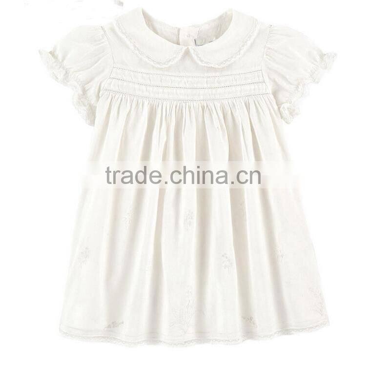 Toddler girl's smocked white dress with collar design