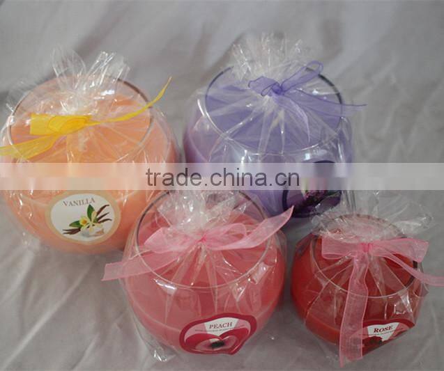 Scented candle in glass jar with lid