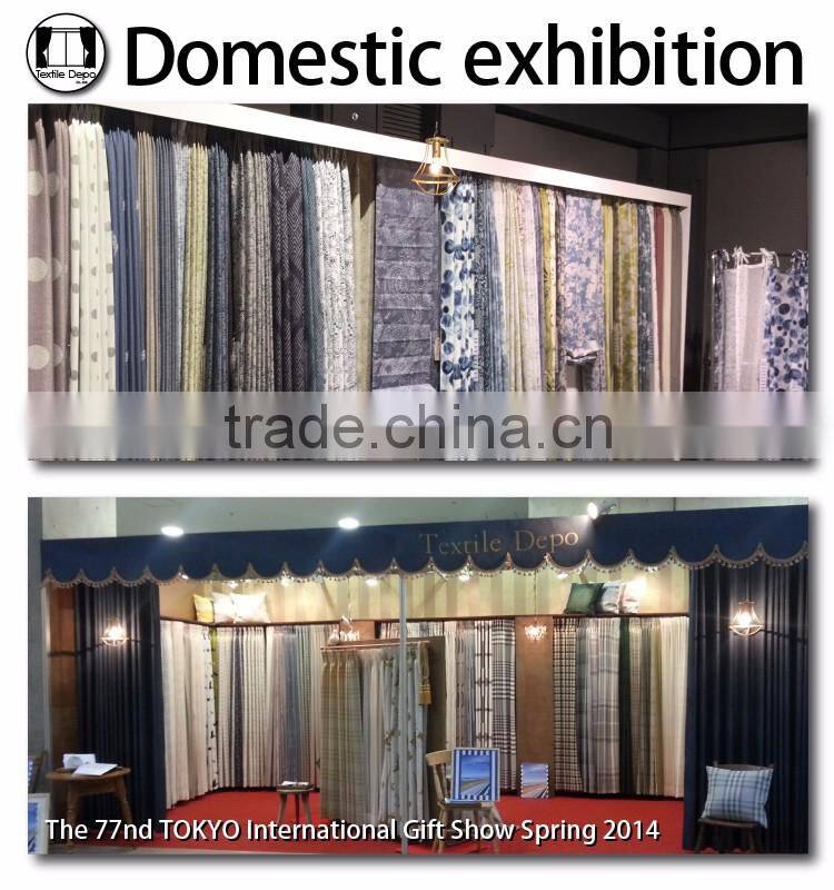 Flame retardant heat reduction continuous curtain fabric made from polyester