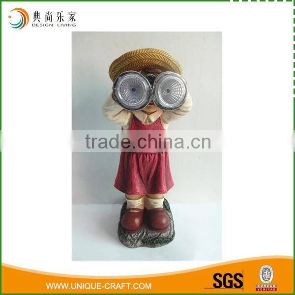 Resin little girl figurine with solar light