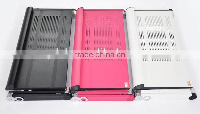 Folding laptop table for computer with cooling fans and mouse Tray and Book Clamping