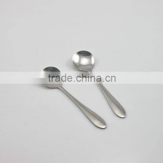 Laser engraving small stainless steel dessert spoon in blister card
