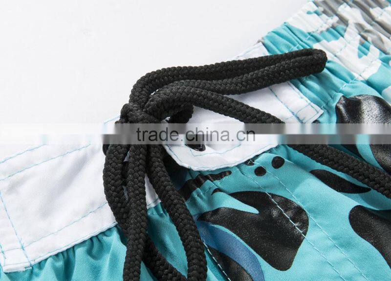 OEM Customized shaped boy swim shorts peach skin 100% polyester