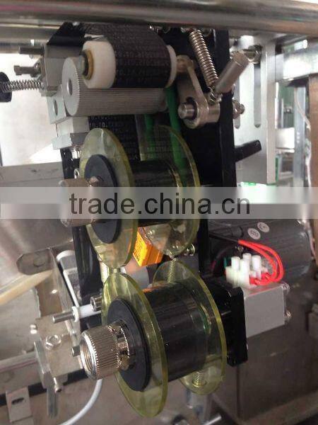 Automatic liquid filling and packing machine