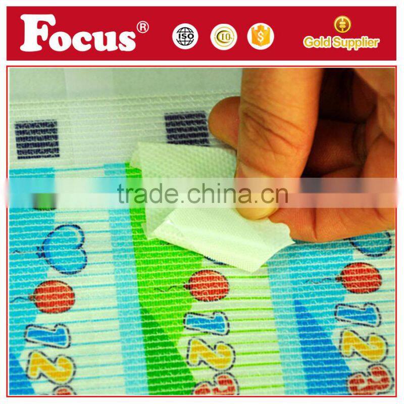 The material in making diaper use magic side tape