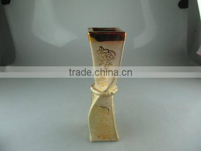 beautiul golden porcelain type vase with flower design