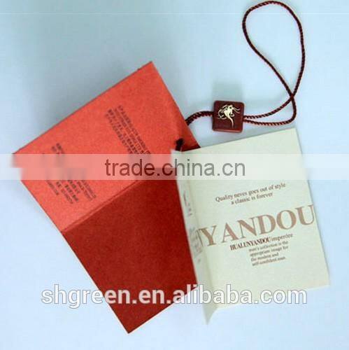 Center fold paper hangtag with plastic string tags for jeans denim