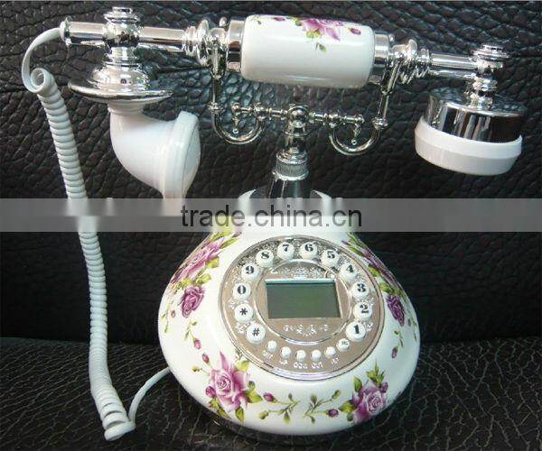 Corded wall mounted analog rotary telephone