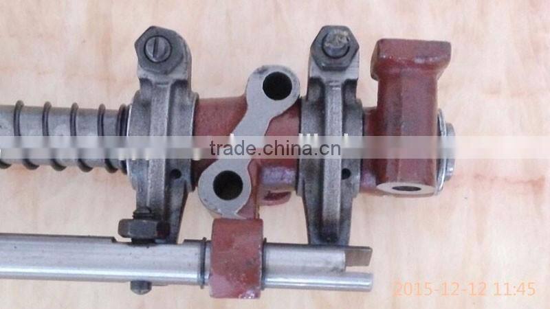 Farm tractor specific double cylinders diesel engine rocker arm assembly