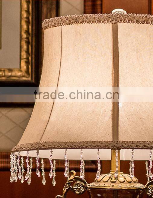 Dark brown cylindrical glass lamp body metal bottom table lamp with fabric lampshade