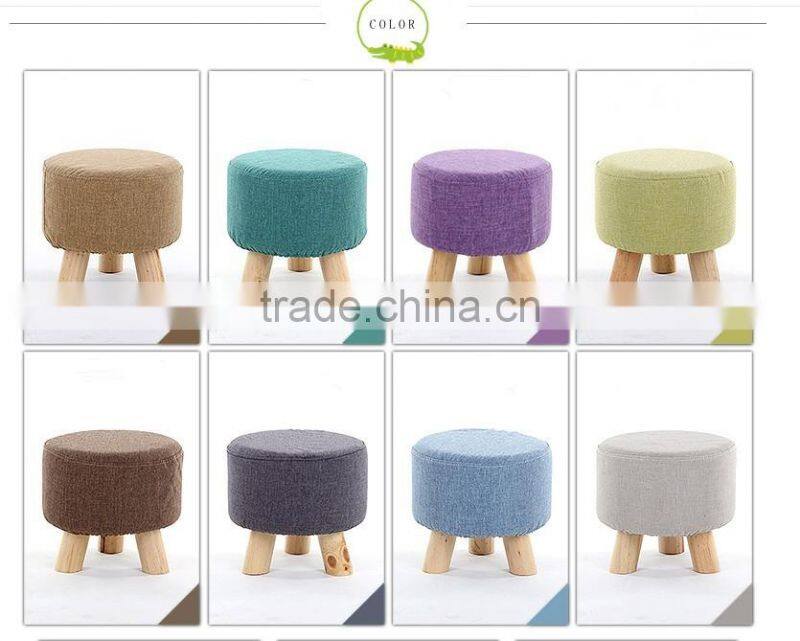Skidproof cheap delicate refined colorful small cloth stool chair with 3 Carbonized wood legs for living room