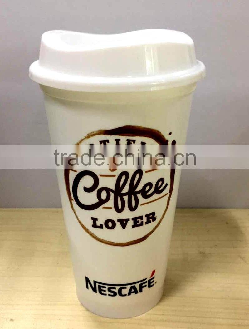 Hot and cold Plastic travel coffee cup with lid and silicone band