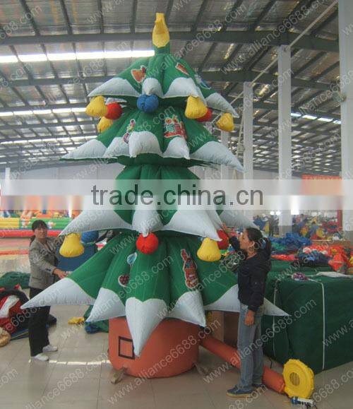 green snowing inflatable christmas tree