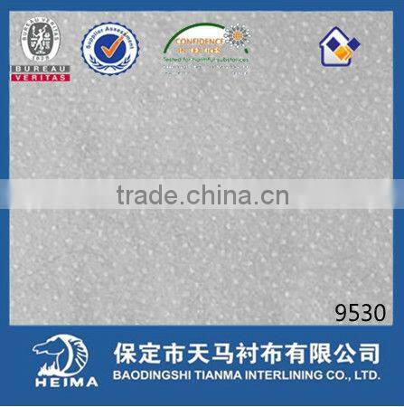 high class nonwoven fusible interlining fabric 9530 for suit uniform and jacket